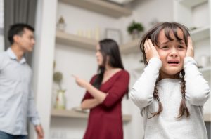 child upset by fighting
