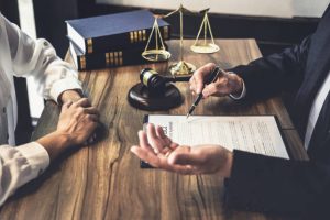 person sitting across from a family lawyer